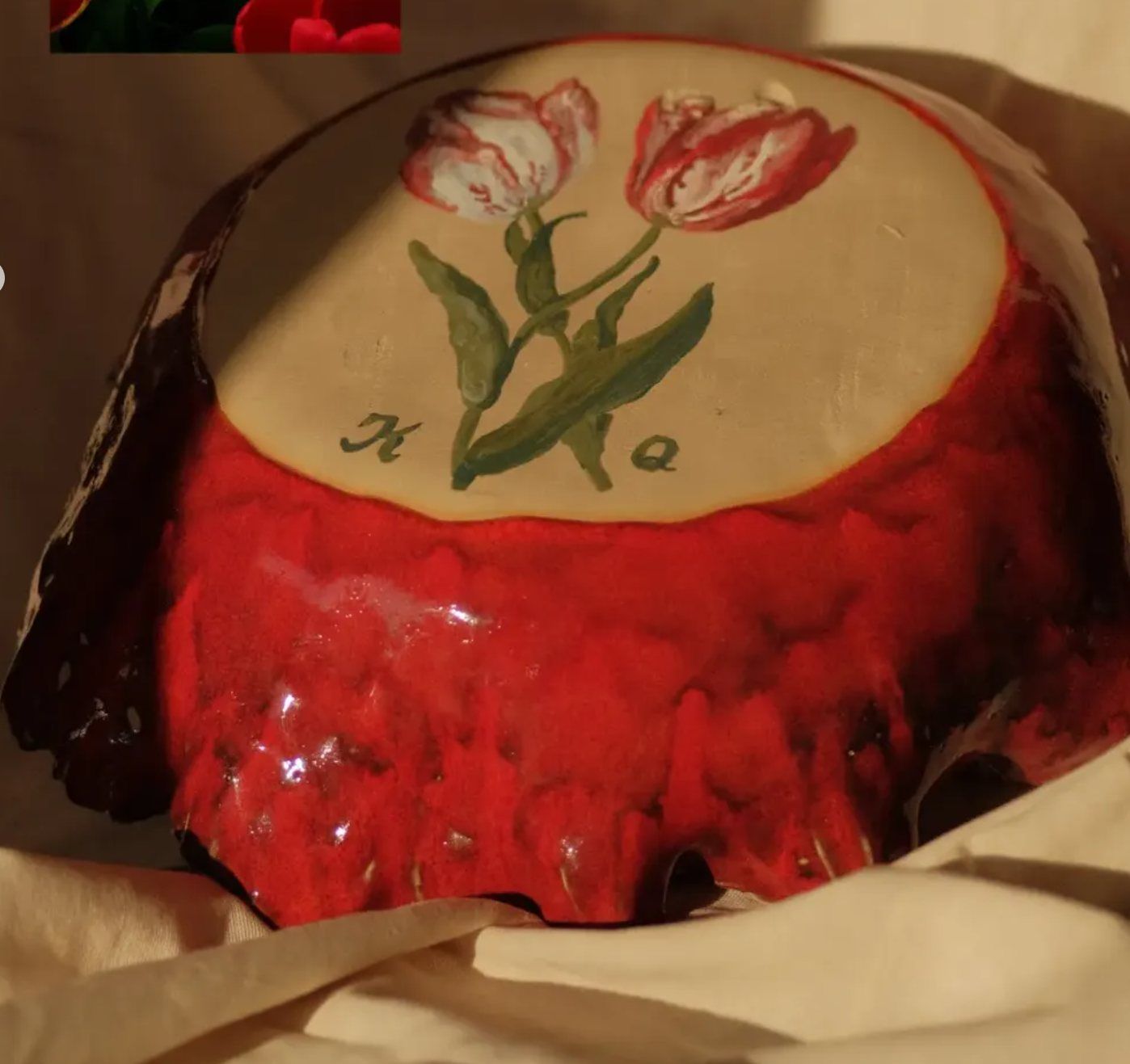 Base of the bowl with two painted tulips and her initials